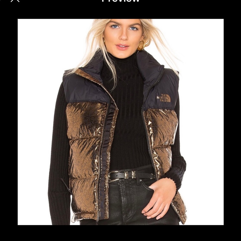 The North Face Nuptse puffer vest. Size:XL color gold and black. New with tags.